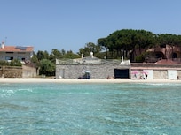 The villa from the sea with the white door to beach