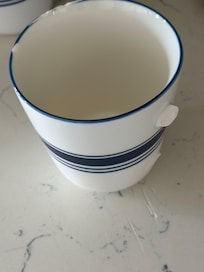 One of the broken coffee cups