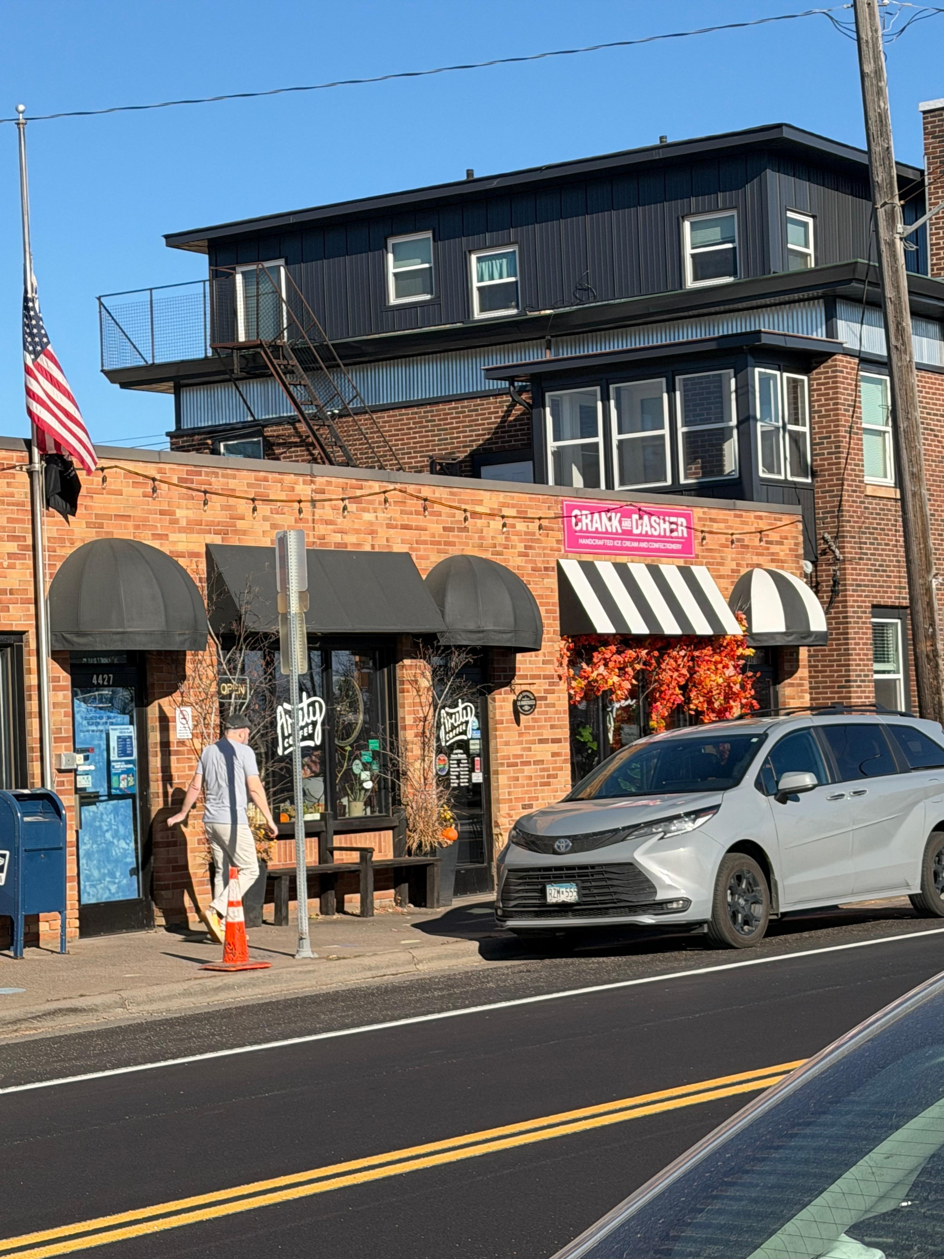 Great coffee shop (plus pastries) right next door. Our condo had 2 porch/balcony/stoop areas (one visible here) to sit out in and get a look toward the lake. 