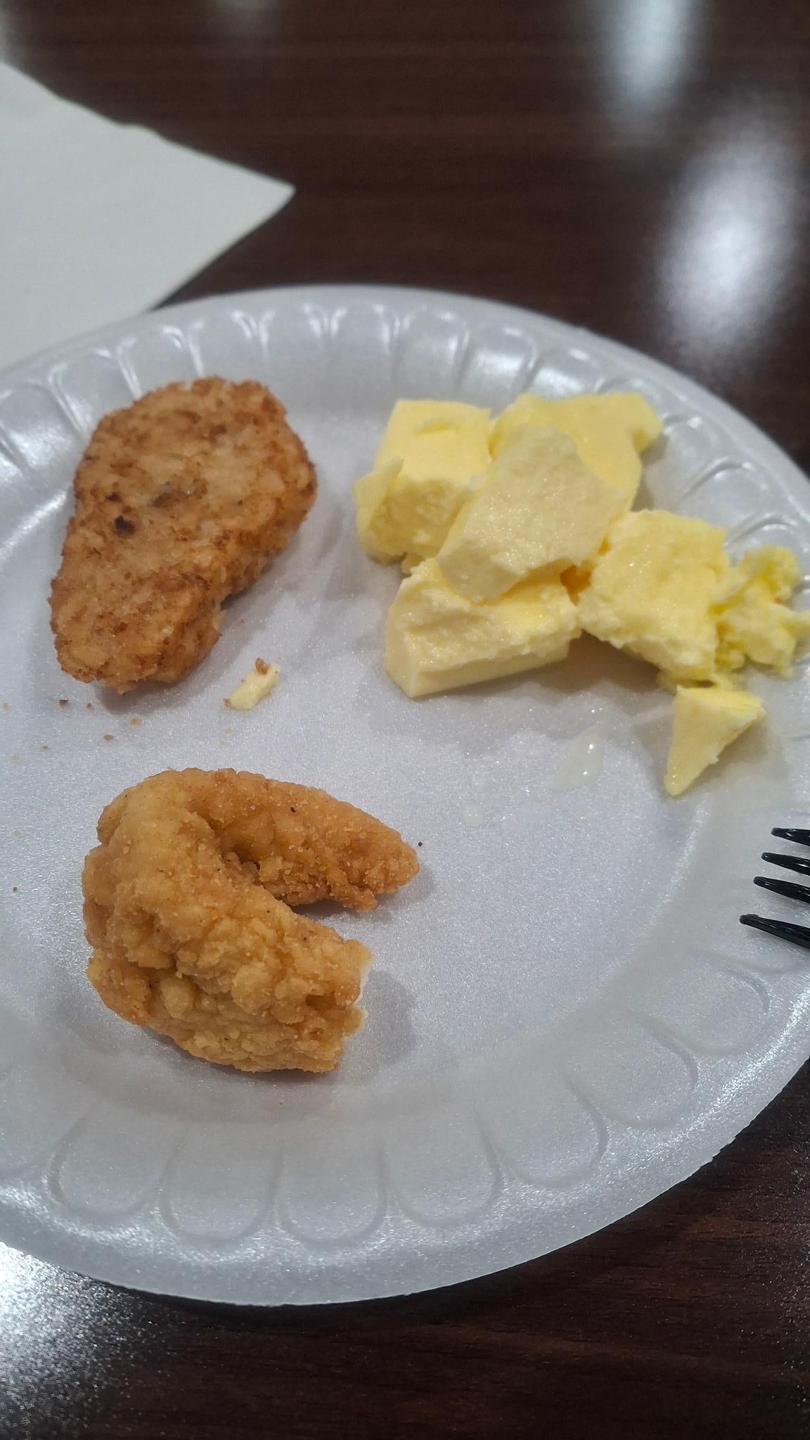 Hash brown, eggs and chicken tender. 