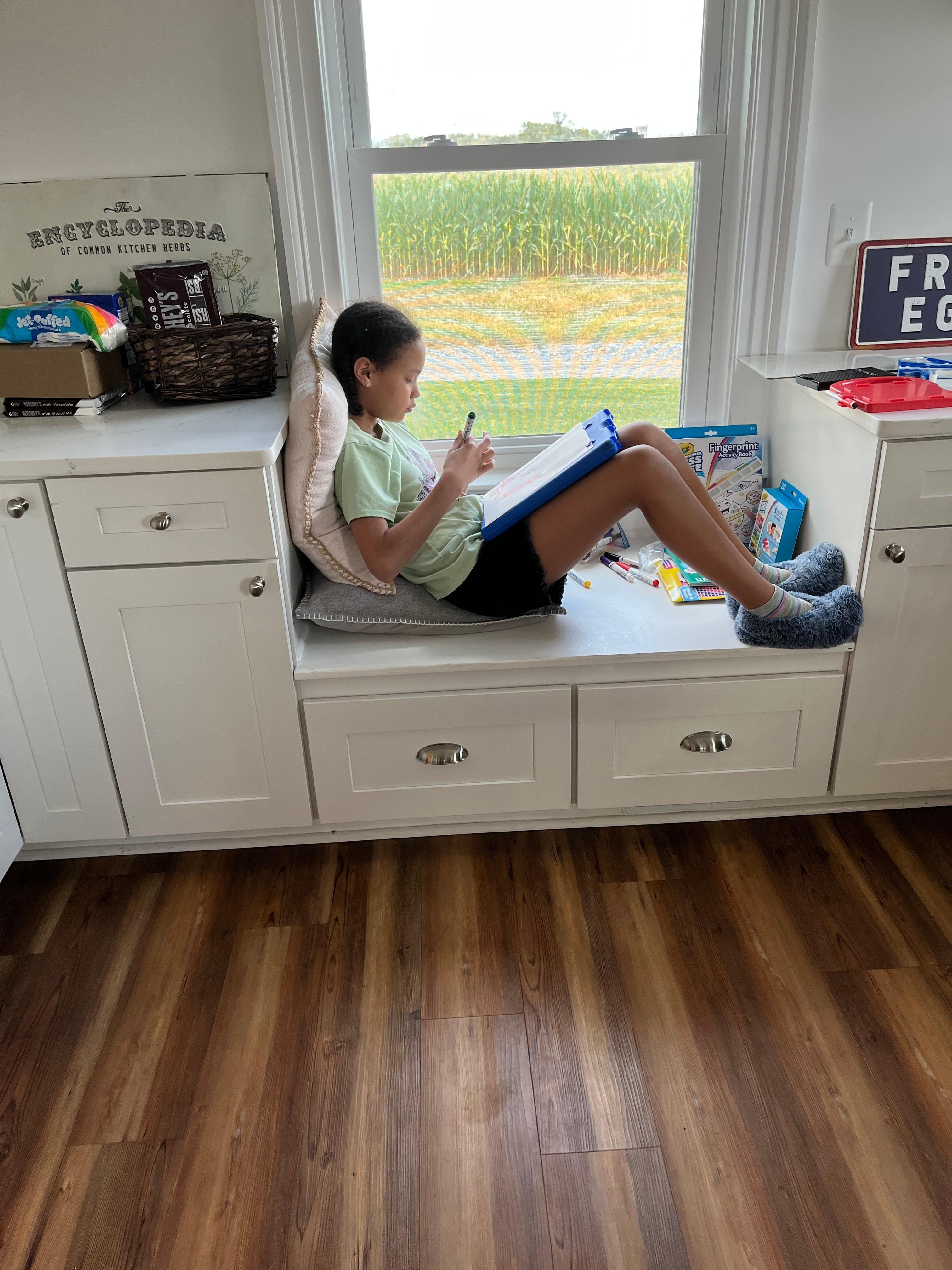 Studying in the breakfast nook.