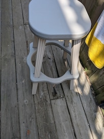 The boards on the deck are rotten and warped and accident waiting to happen along with rusty nails sticking out everywhere