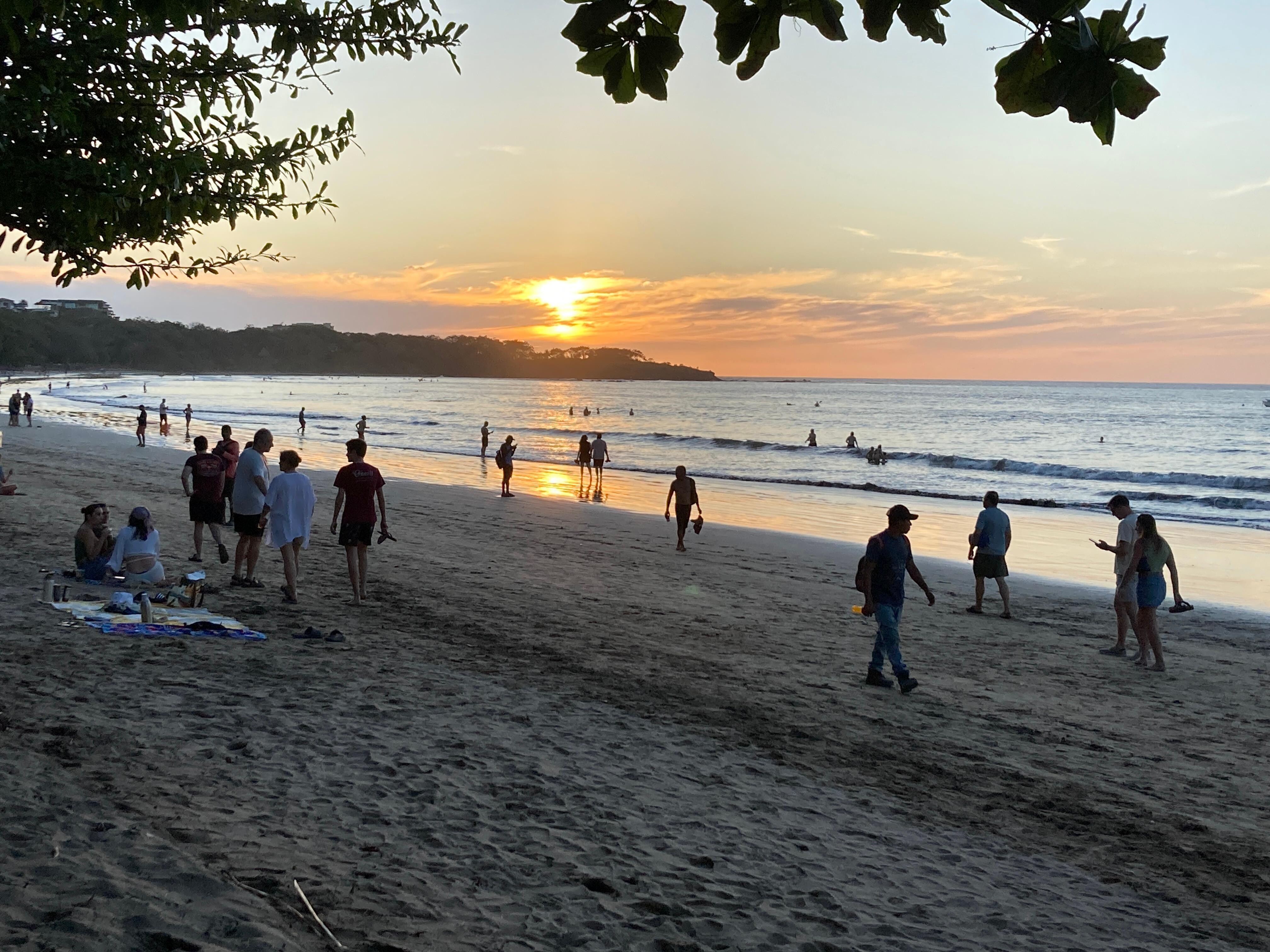 Sunset on Tamarindo beach at happy hour.