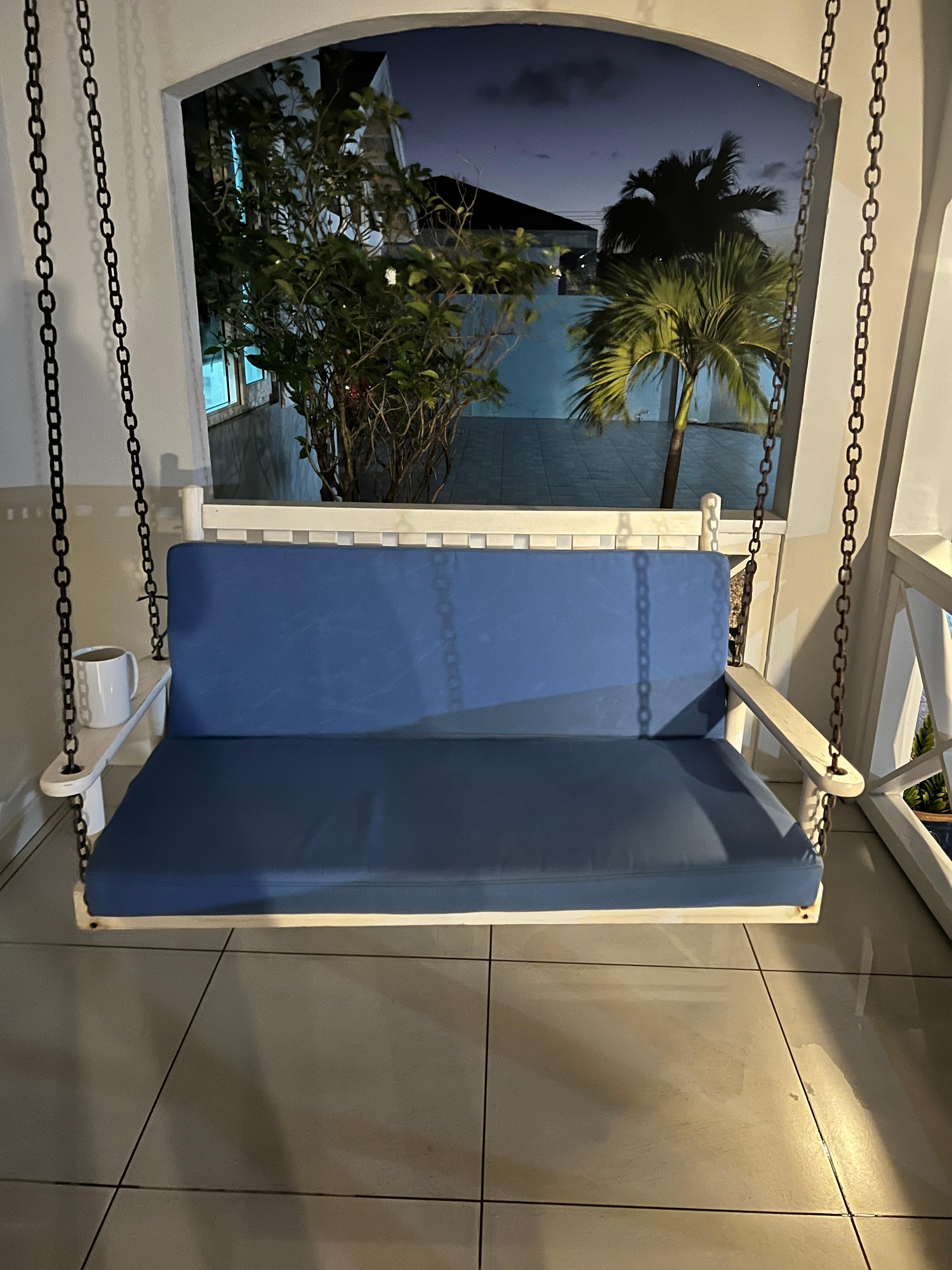 Front porch swing, perfect for morning coffee