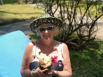 Fresh coconut and hat made by the Gardener