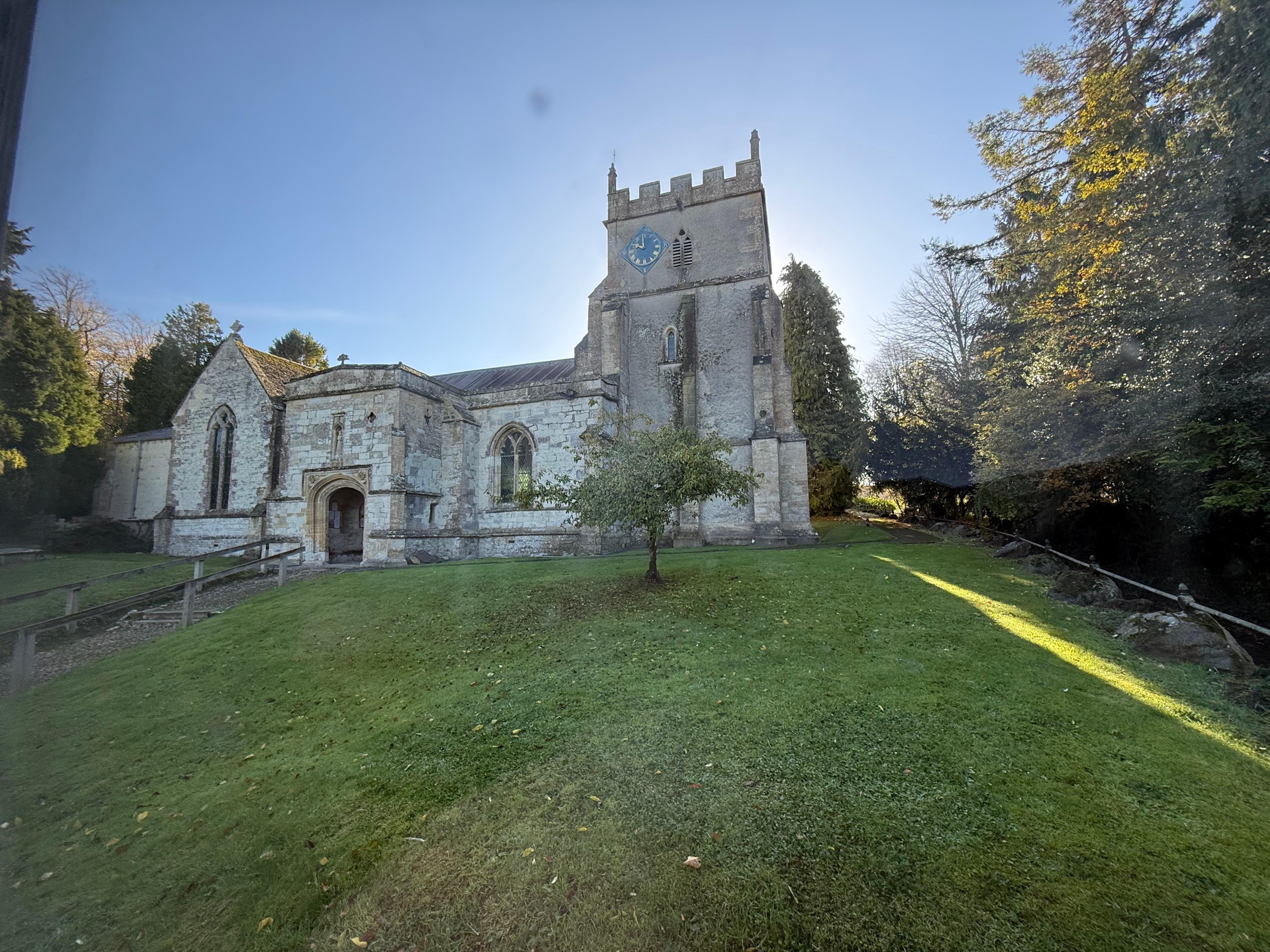 The church immediately behind the cottage