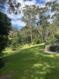 Views from alfresco of cottage to the large beautiful garden.