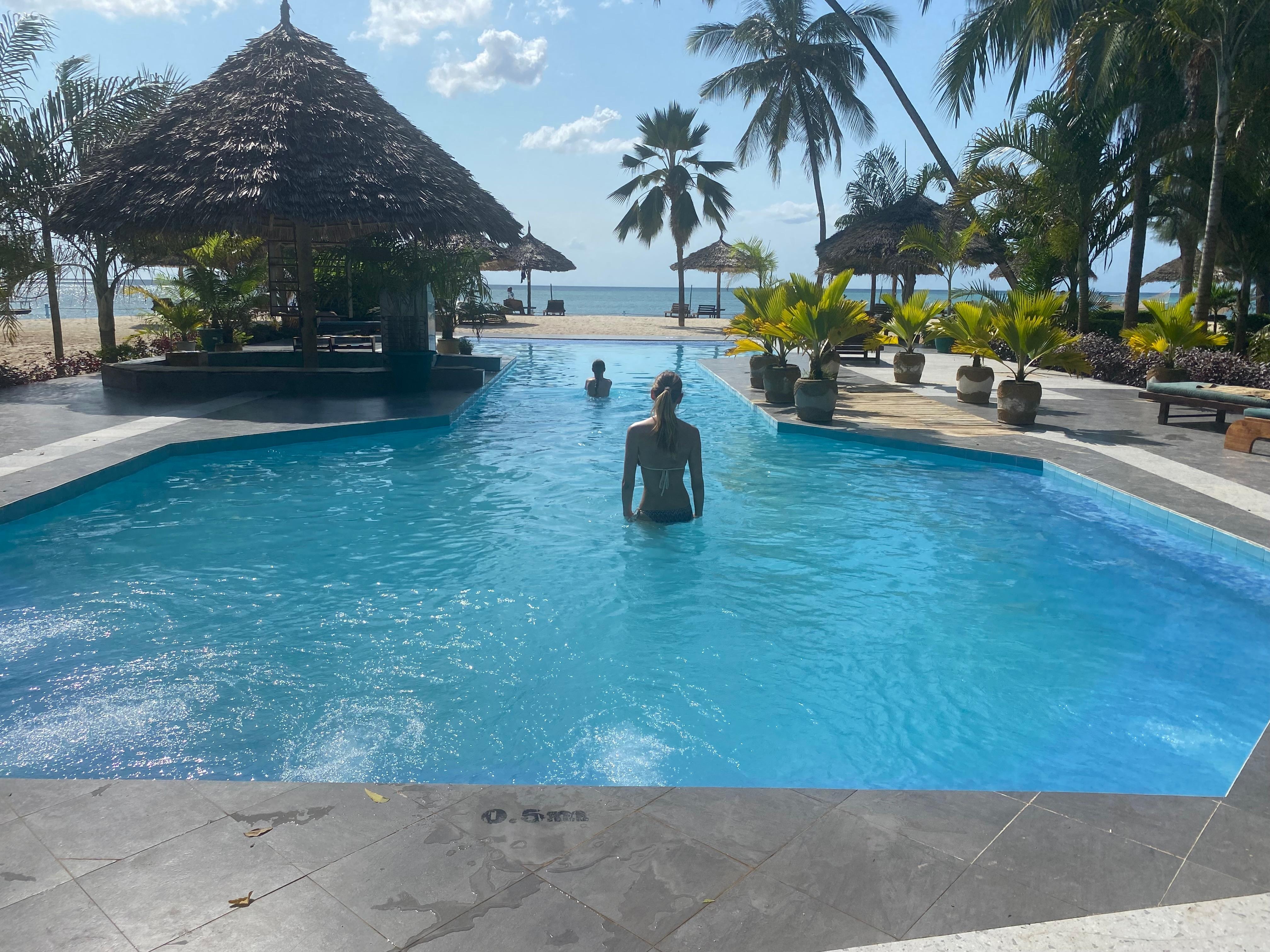 Nice pool with sunbeds, shade and even electricity for charging phones! 