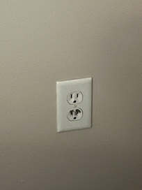 Burn marks adorning the electrical socket.
