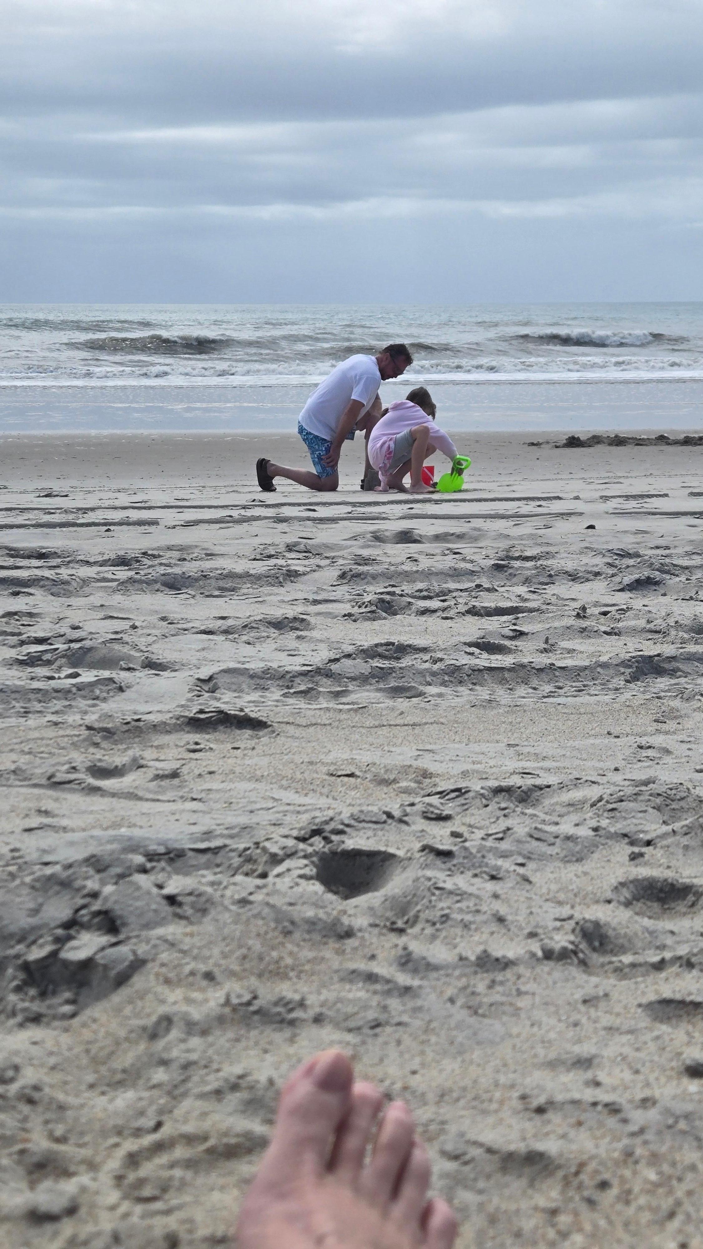 Large sandy beach area to relax or play
