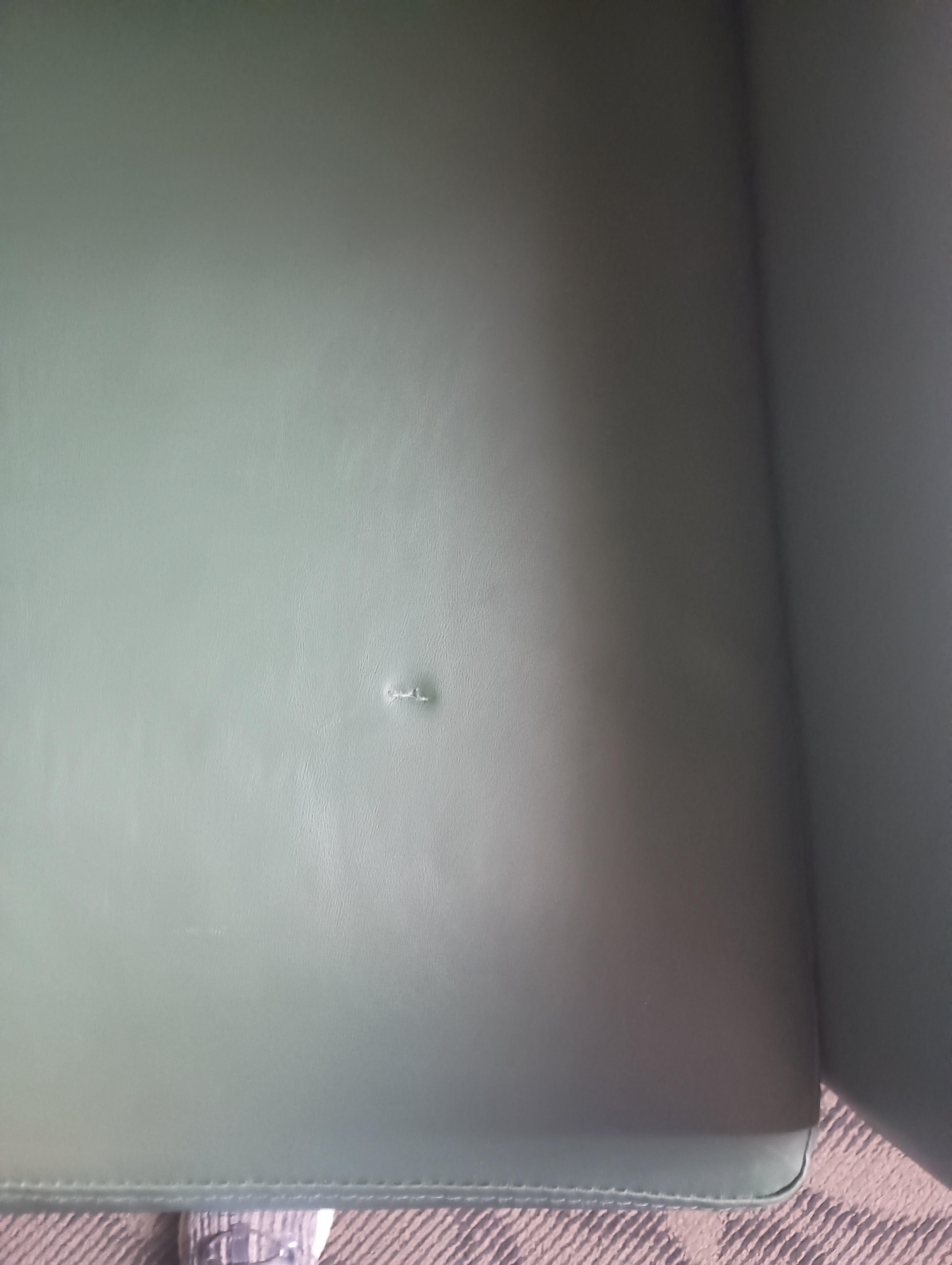 Hole in cushion of the chair when we checked in 