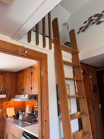 Stairs to loft with bed