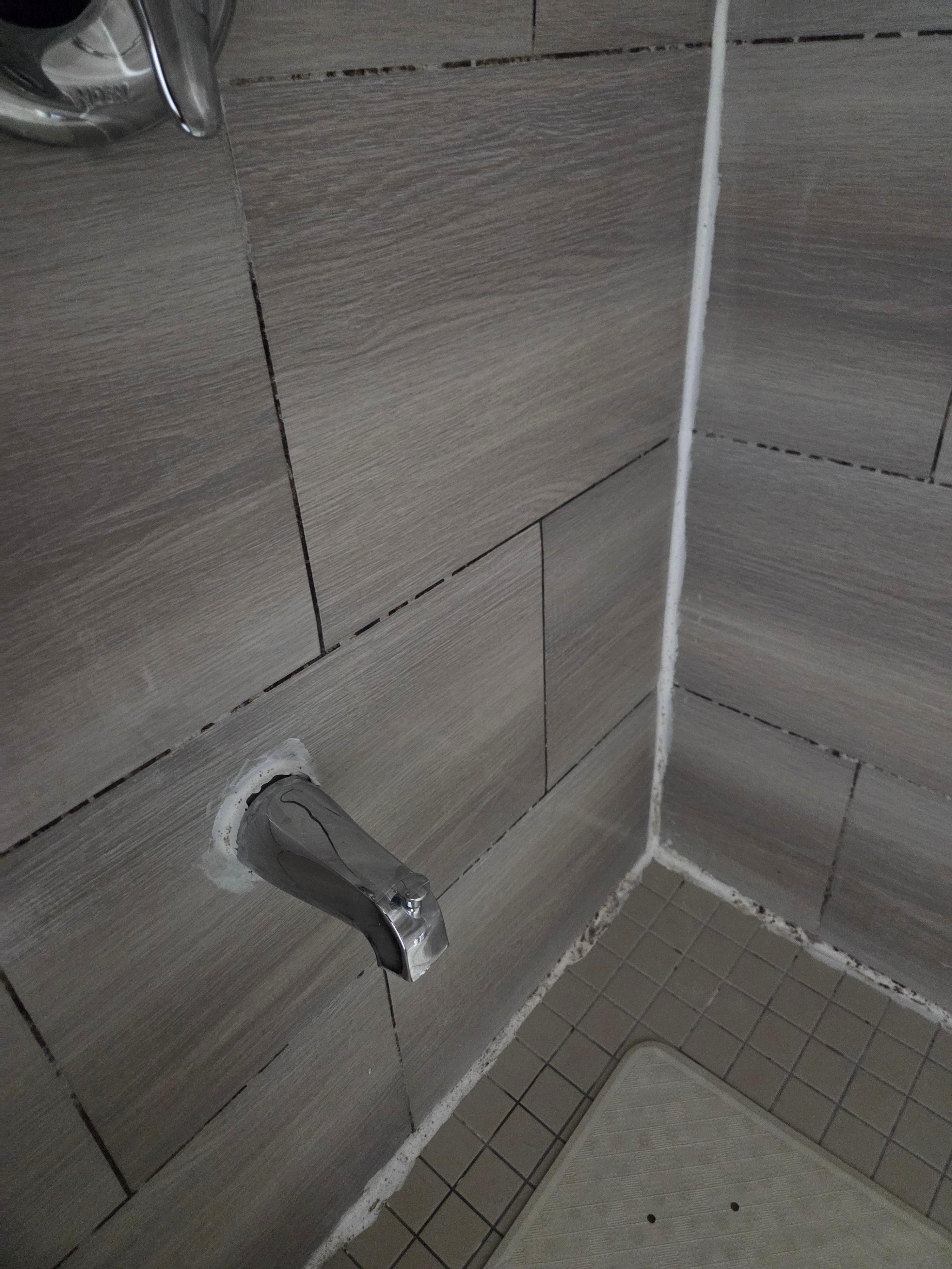 Sealant peeling and moldy indicating the shower has not been maintained nor cleaned to hygenic standards