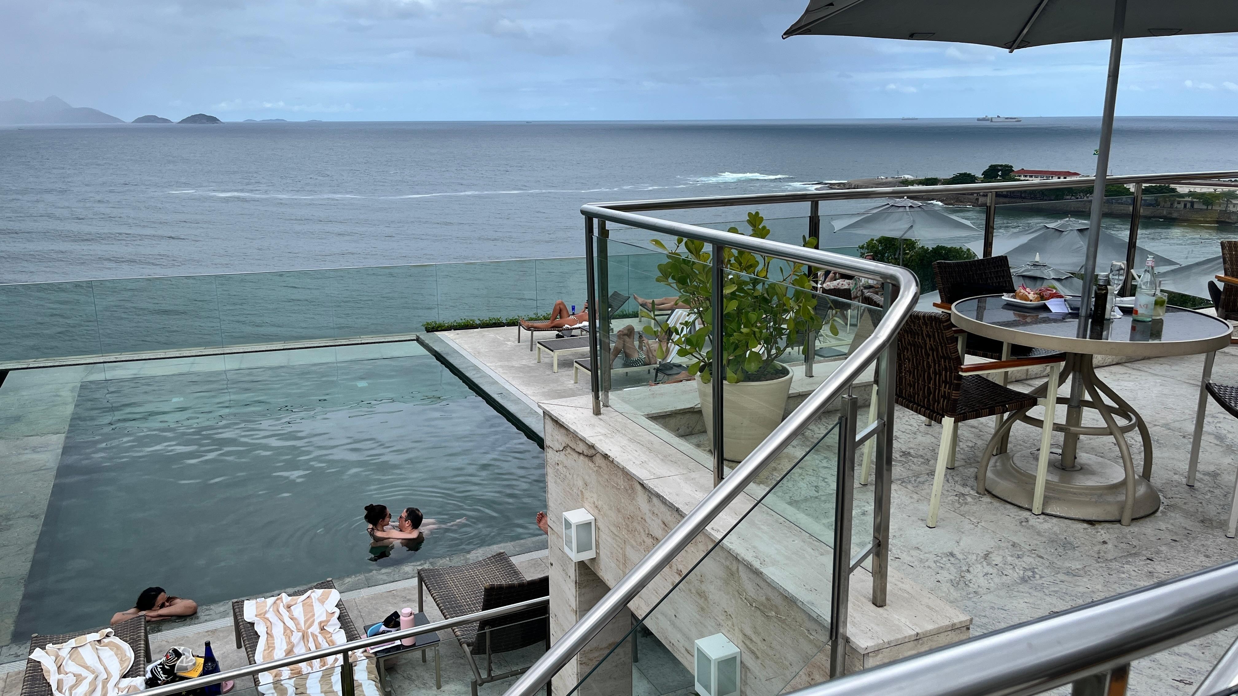 Rooftop pool and lounge area. 