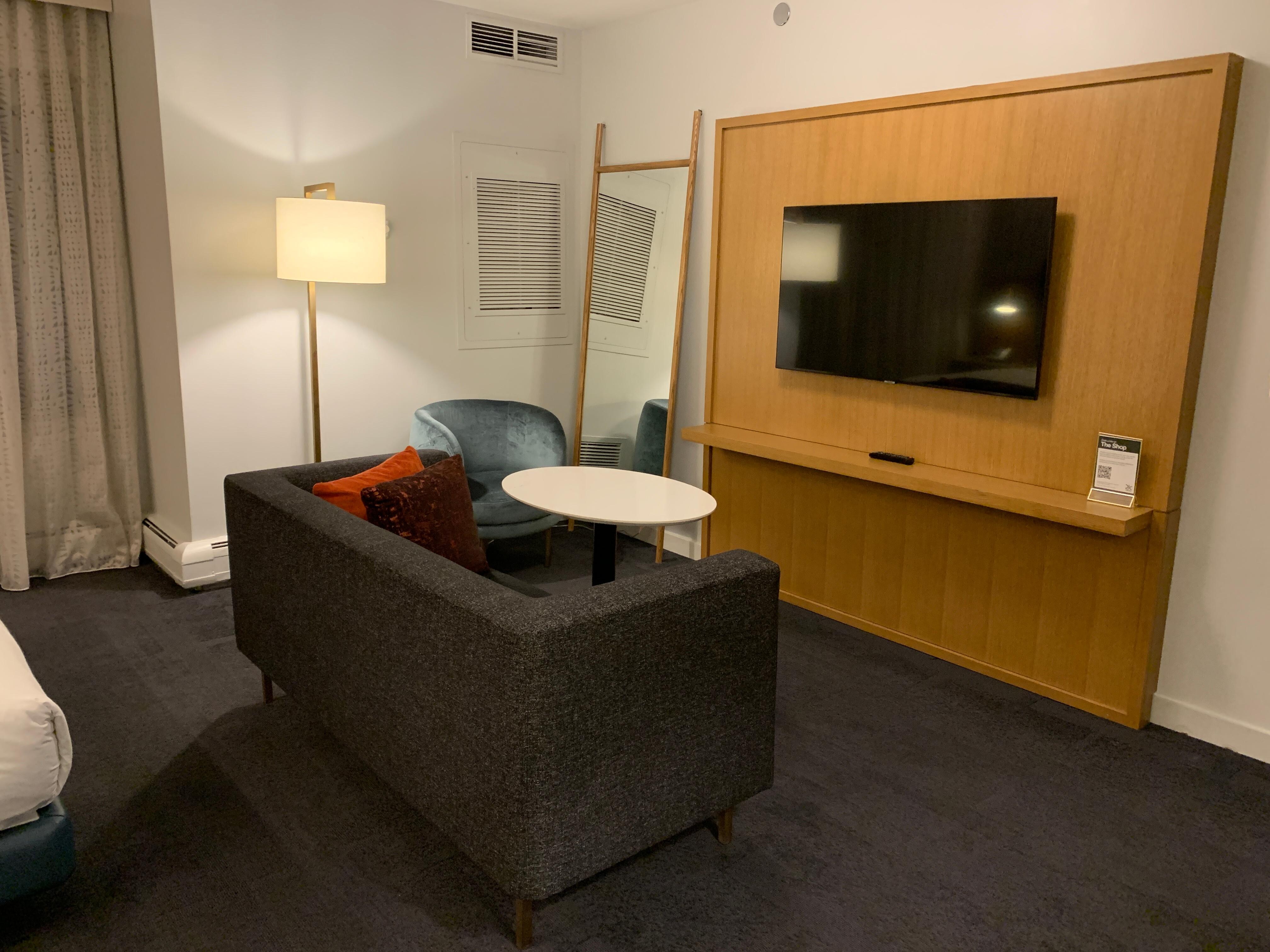 Sitting area in front of bed