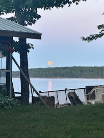 Moon rising over Lake Superior from docks at Kimar resort.
