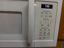 Warning light on microwave