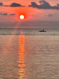 Watching the sunrise from the balcony