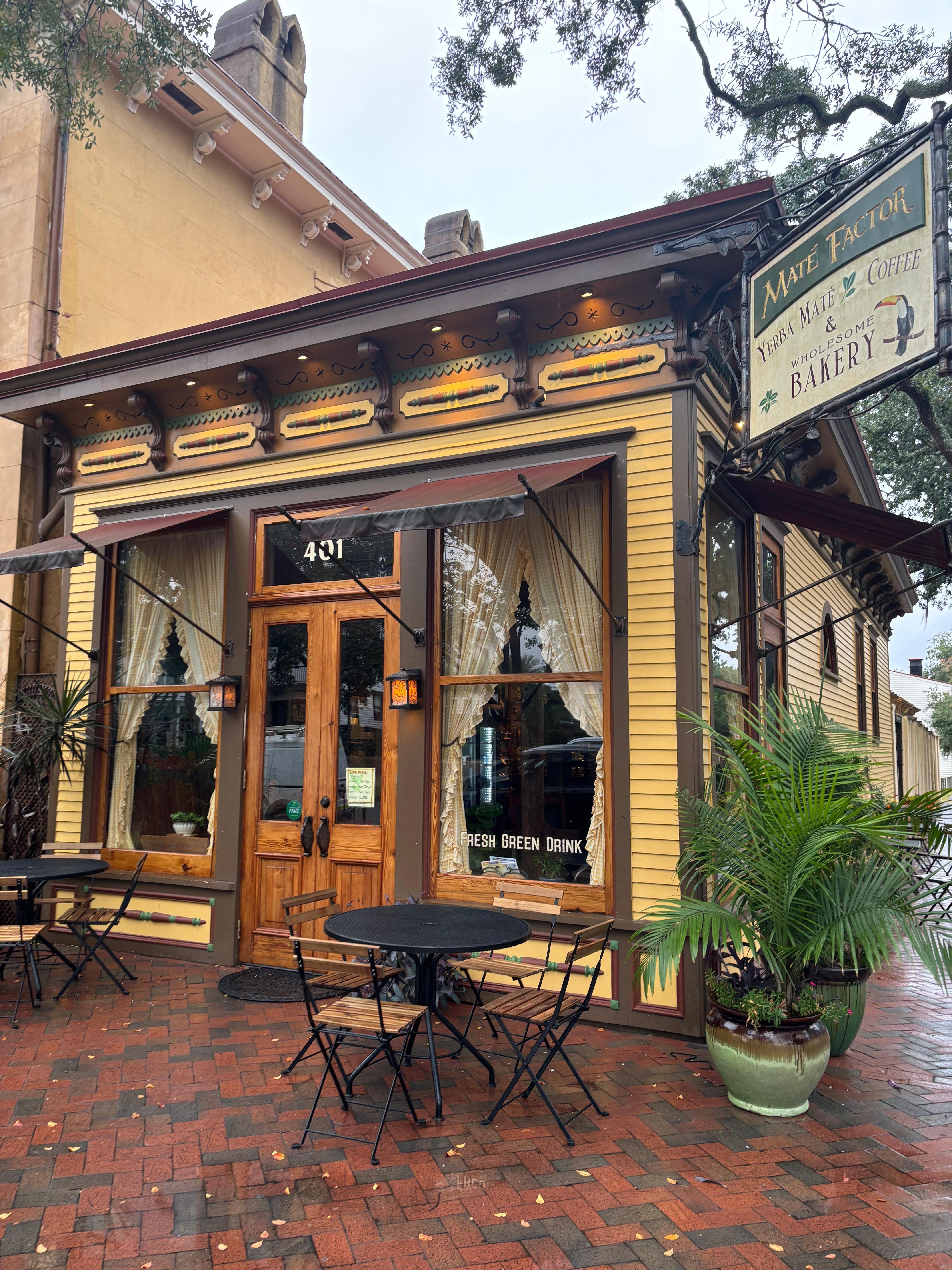 Just at the corner, aprox two houses down