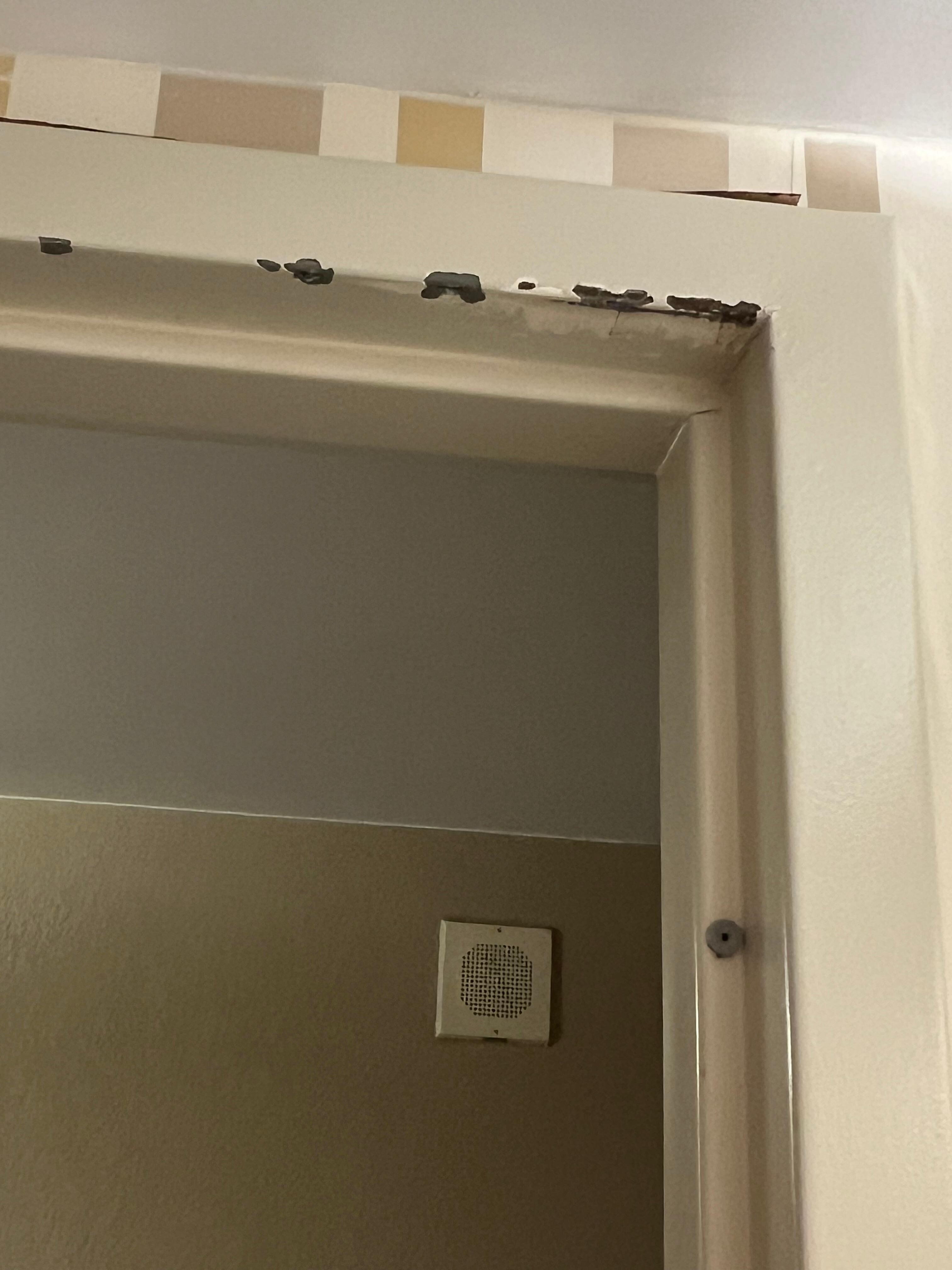 Door jam in bathroom. Paint works