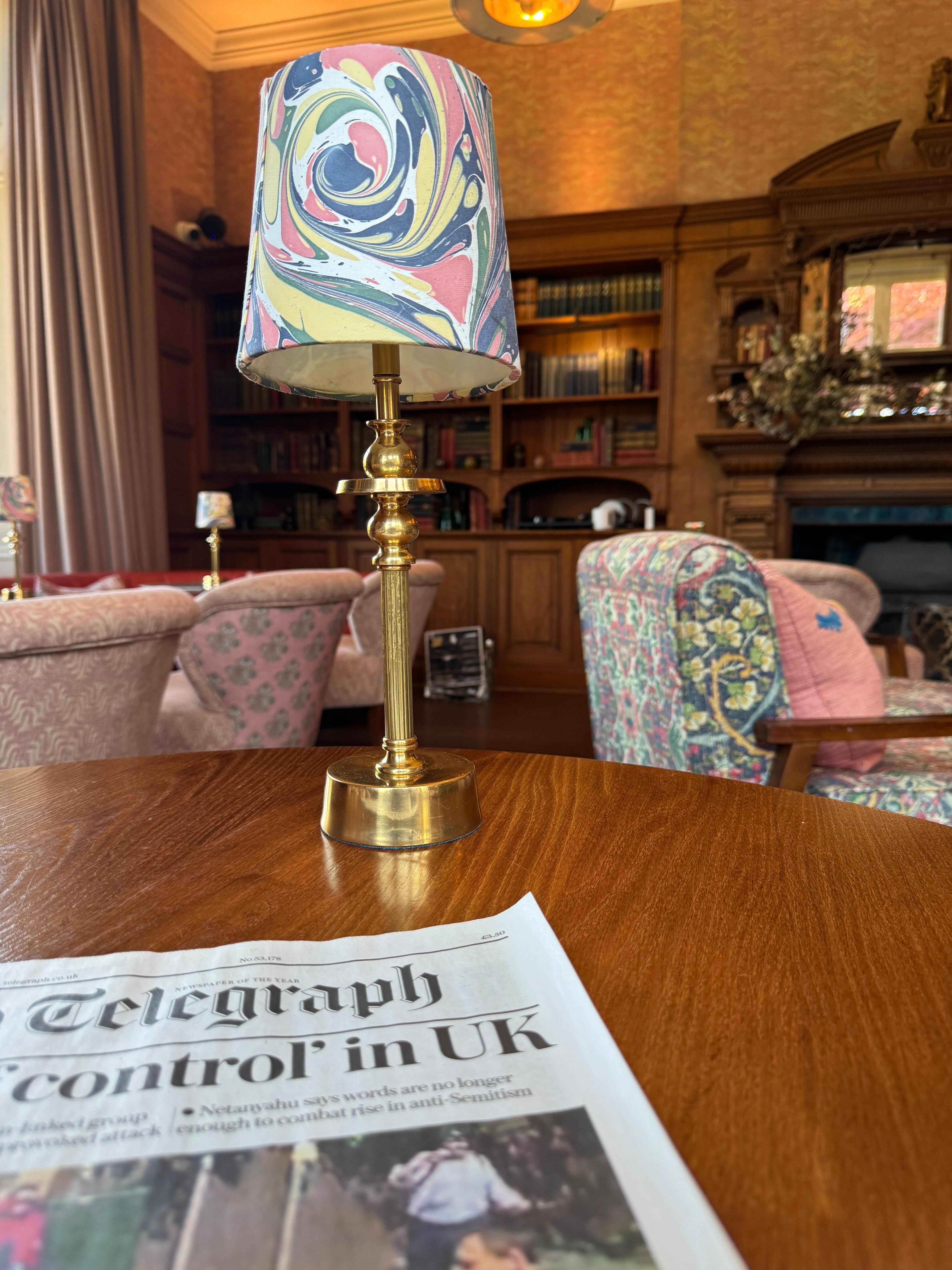 Morning papers in the lounge overlooking the lovely garden.