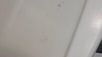 Floating gunk in the shower not sure what it is