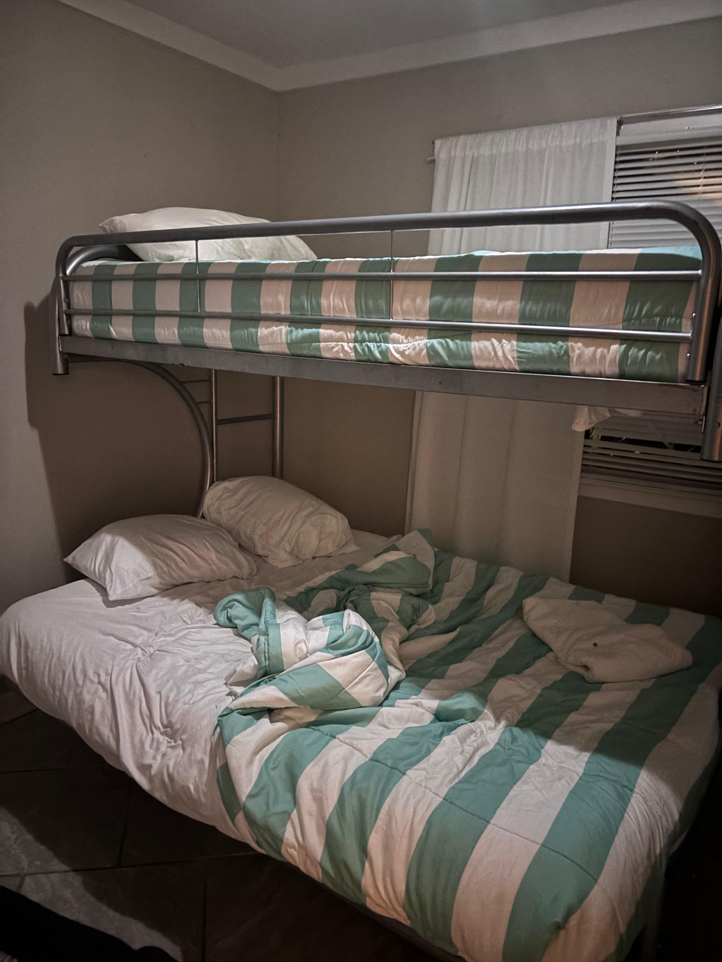 bunk beds with mattress so thin you can feel the springs