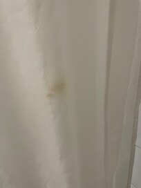Brown spots on the shower curtain