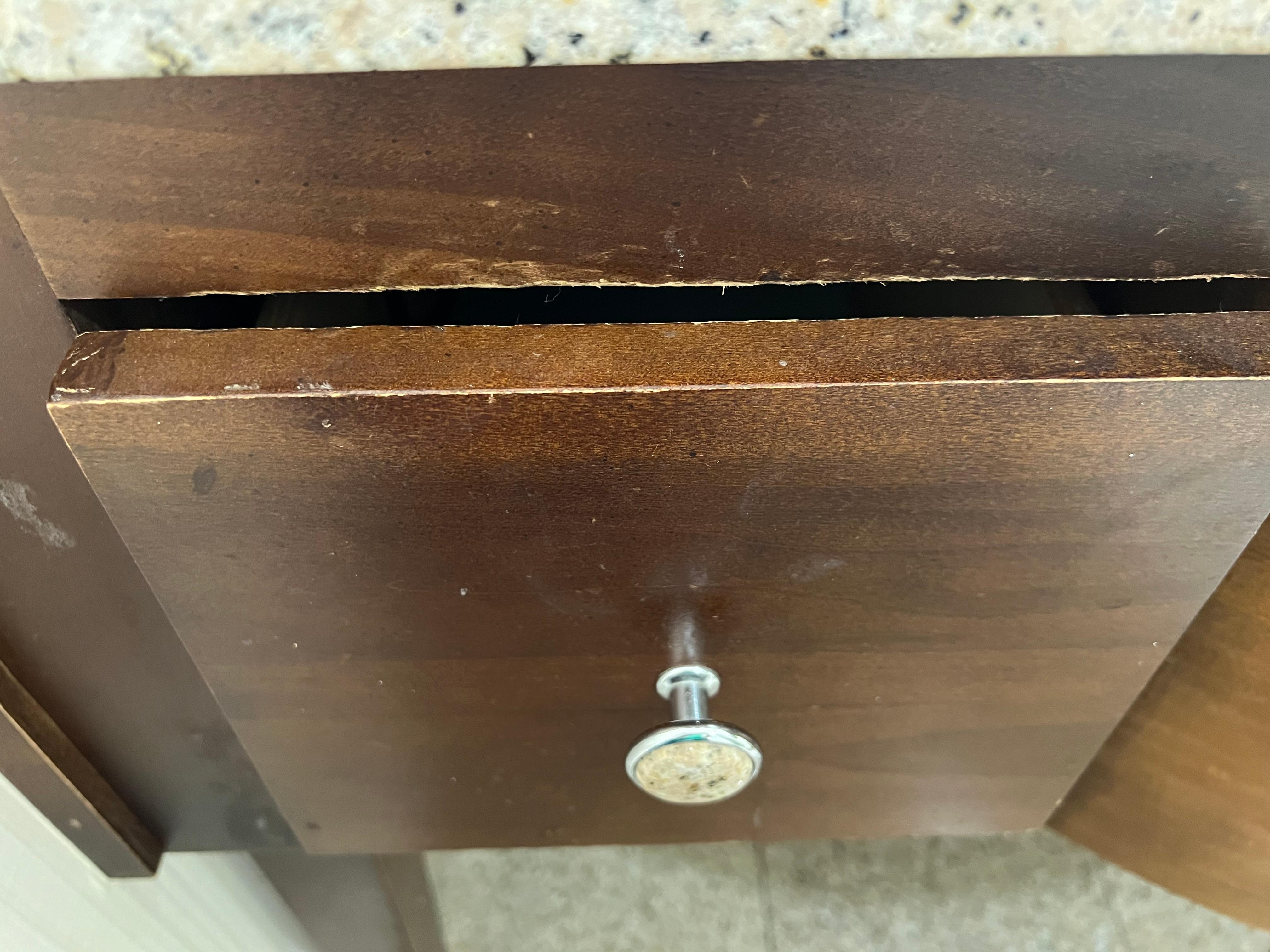 Broken down furniture in bathroom 