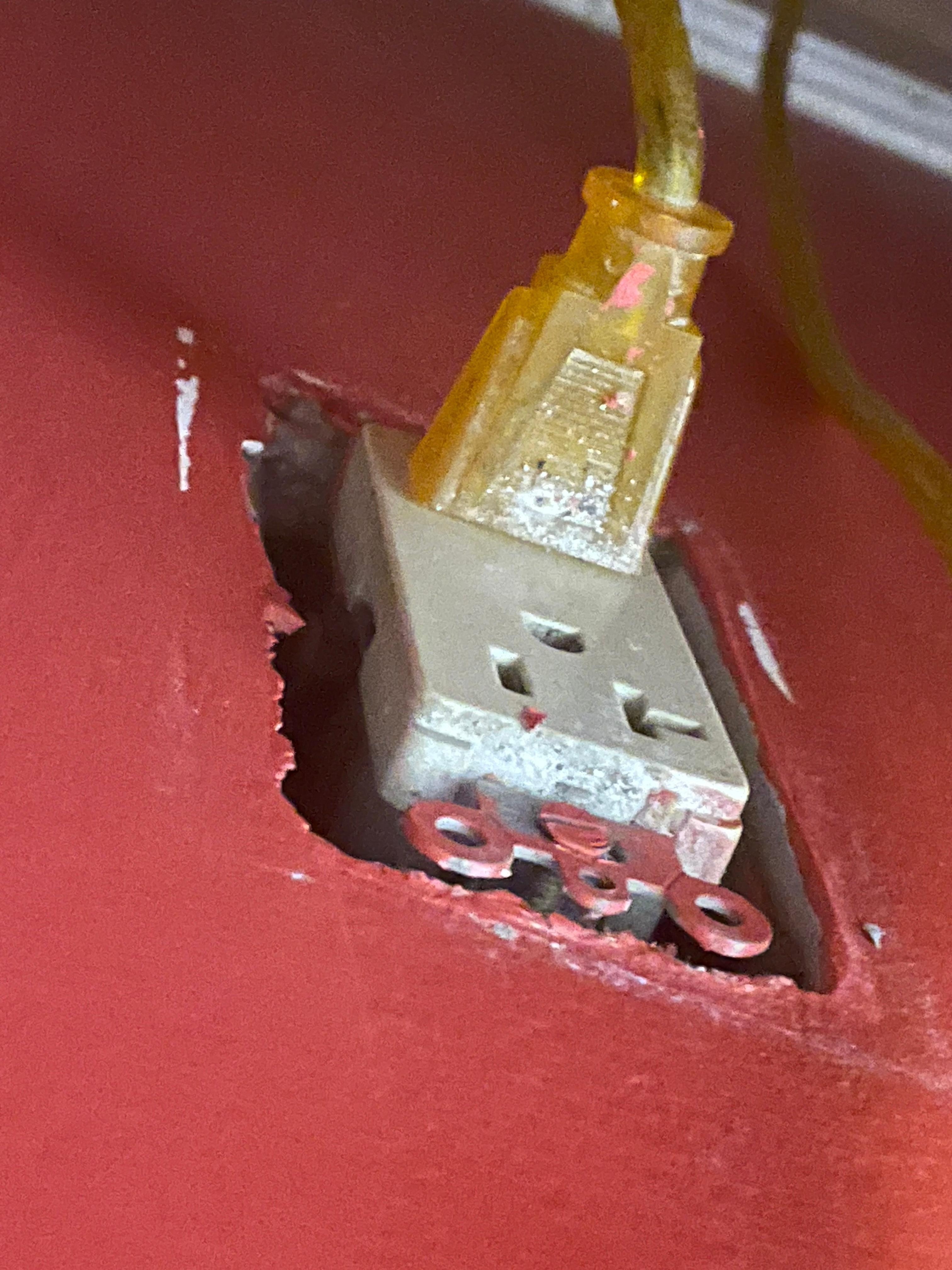 Bedside outlet plate missing and electrical not secured