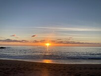 Sunset from beach across from Sand Pebbles Inn