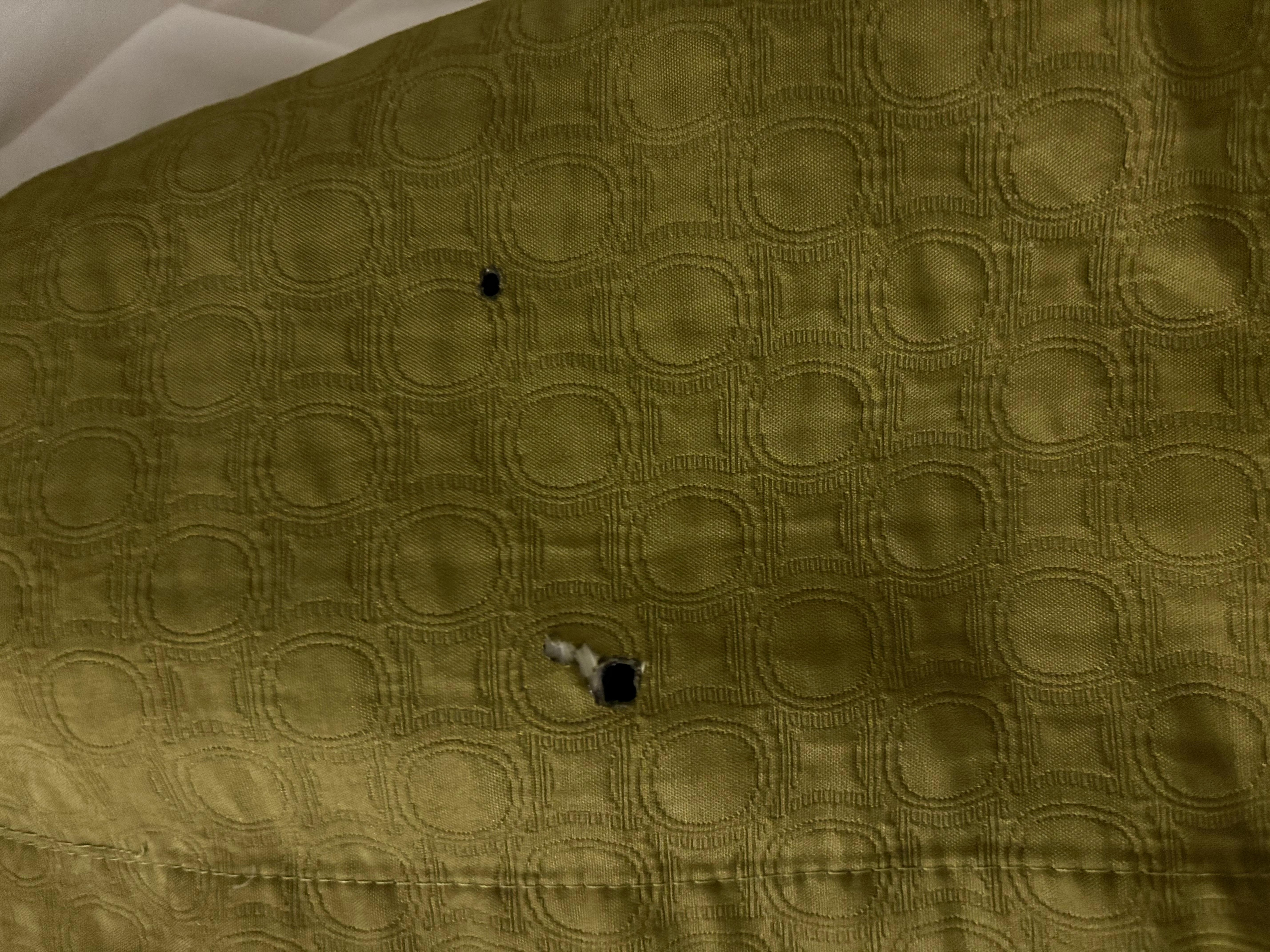 Example of burn holes in bedding
