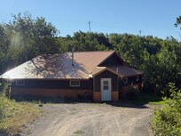 The outside of the house.