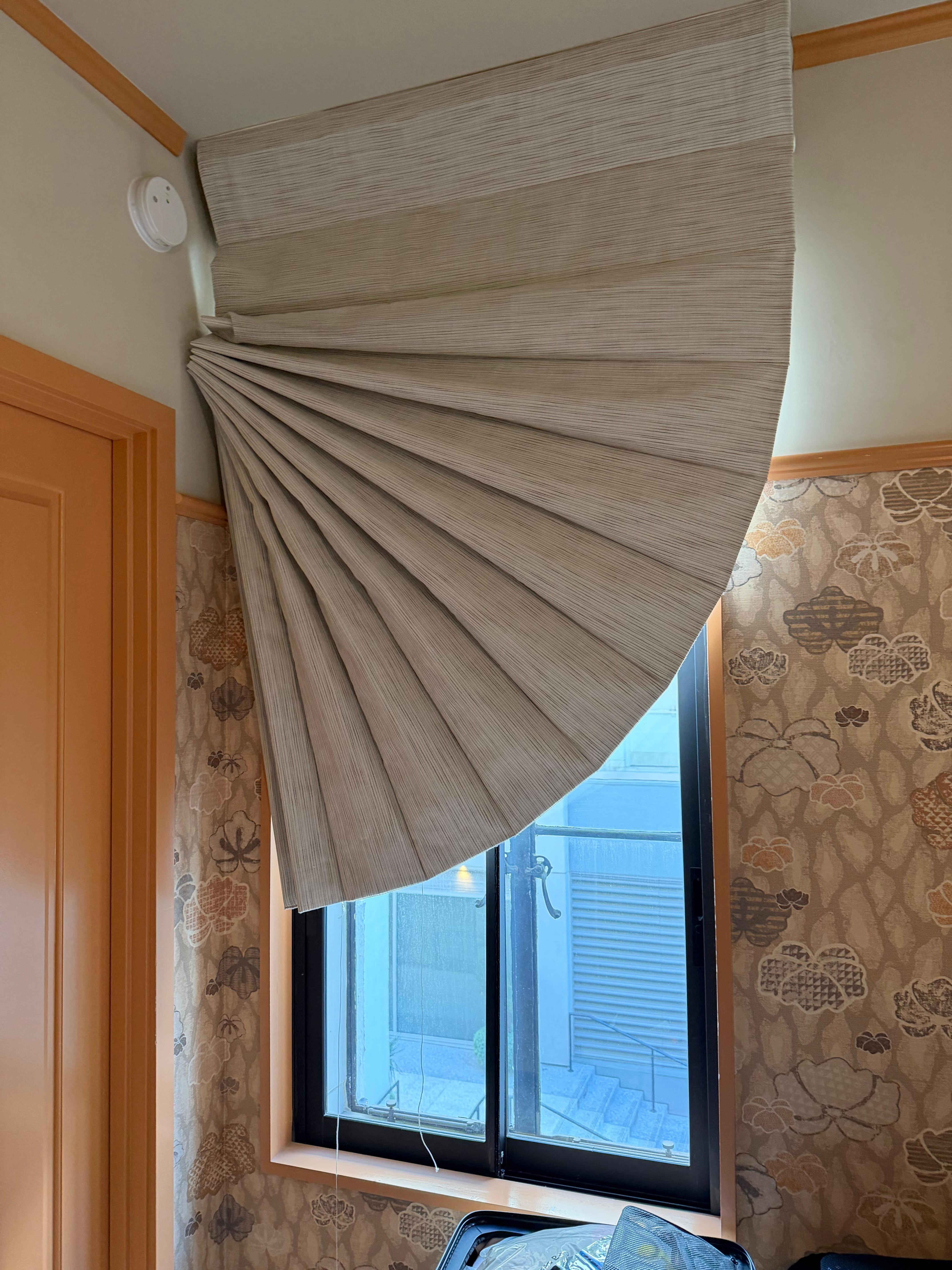 Broken curtain, is this part of their abstract design?