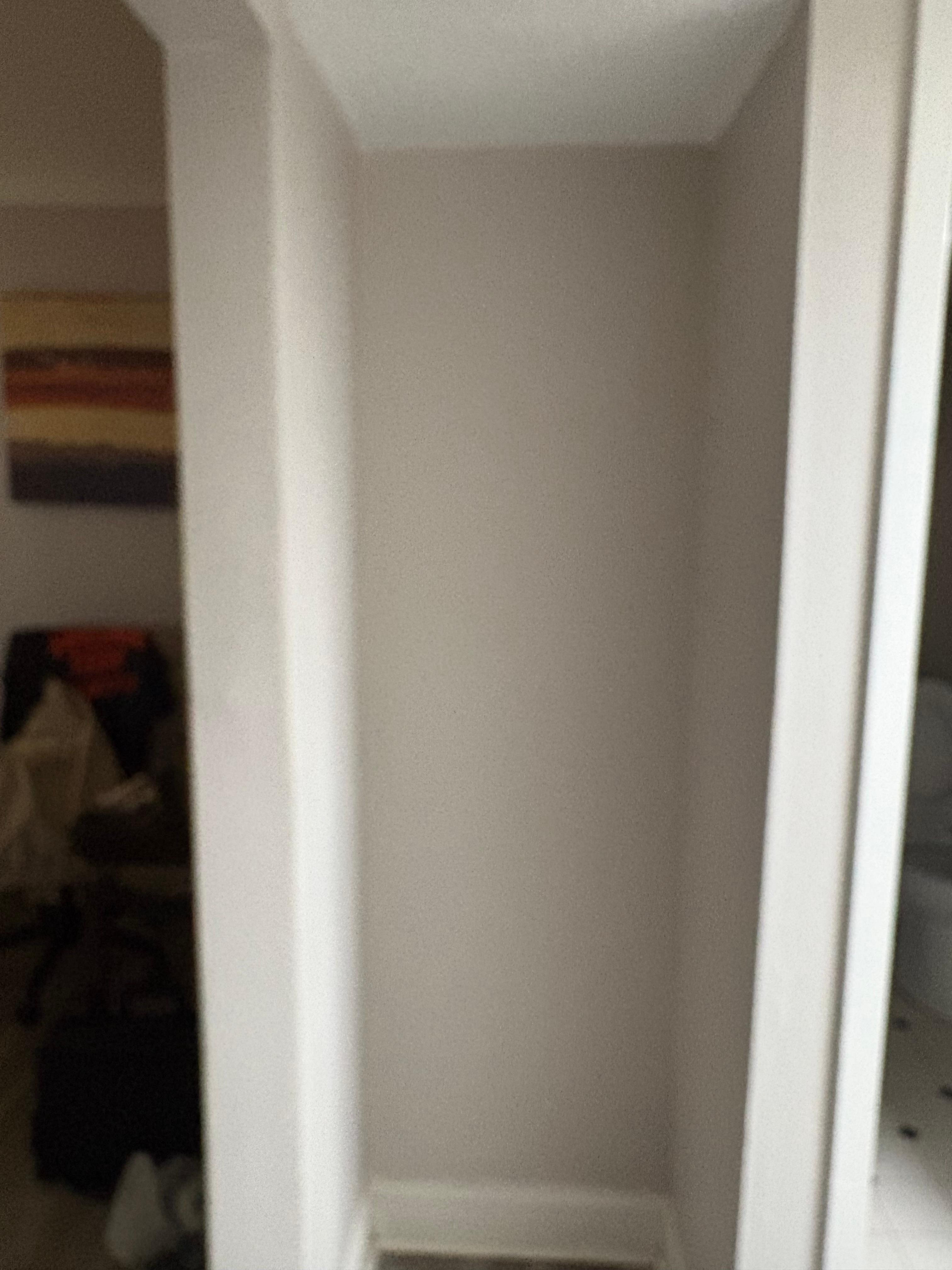 Hanging in clothes area with no rod.