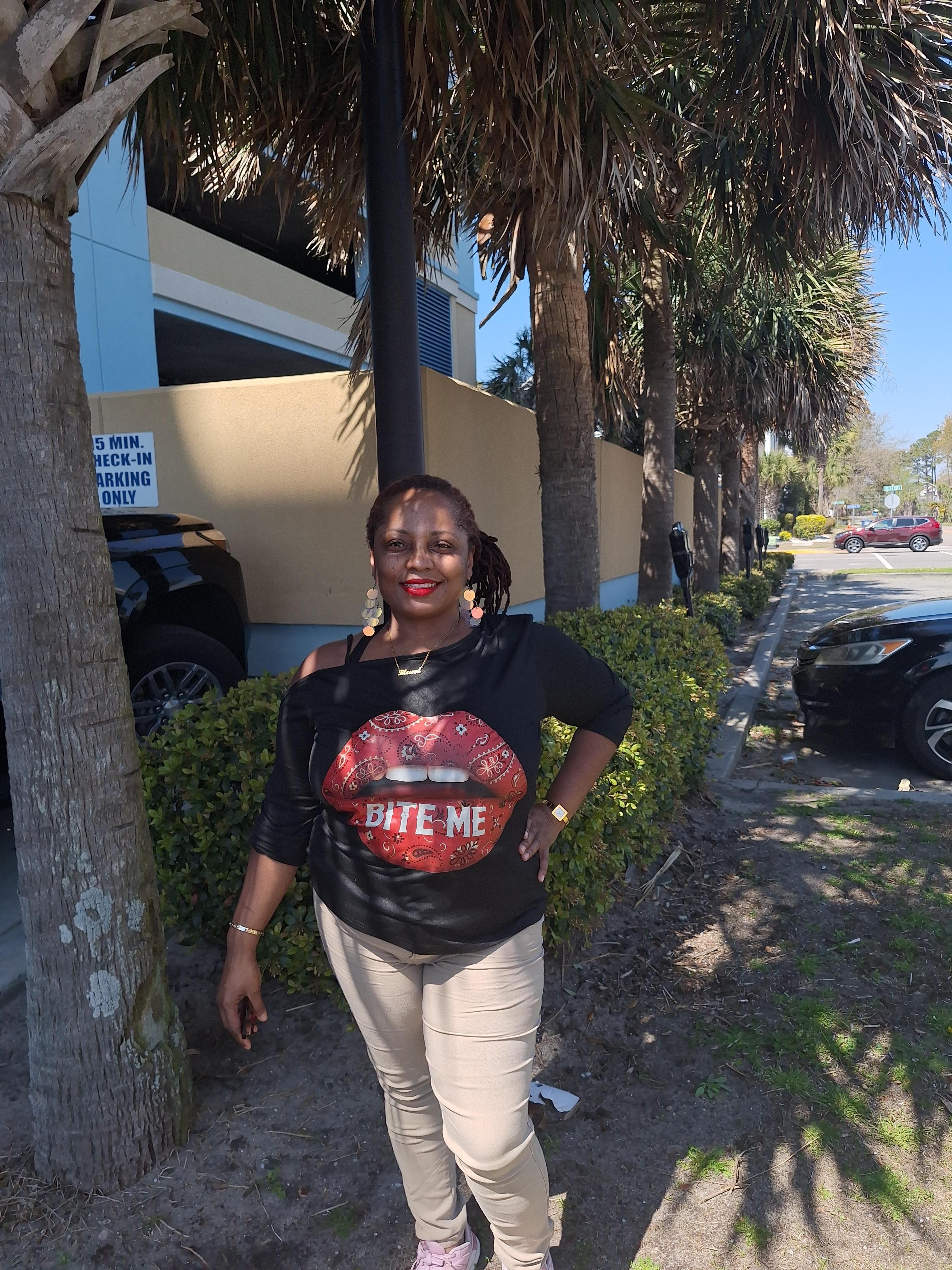 Side of the property..steps away from the beach