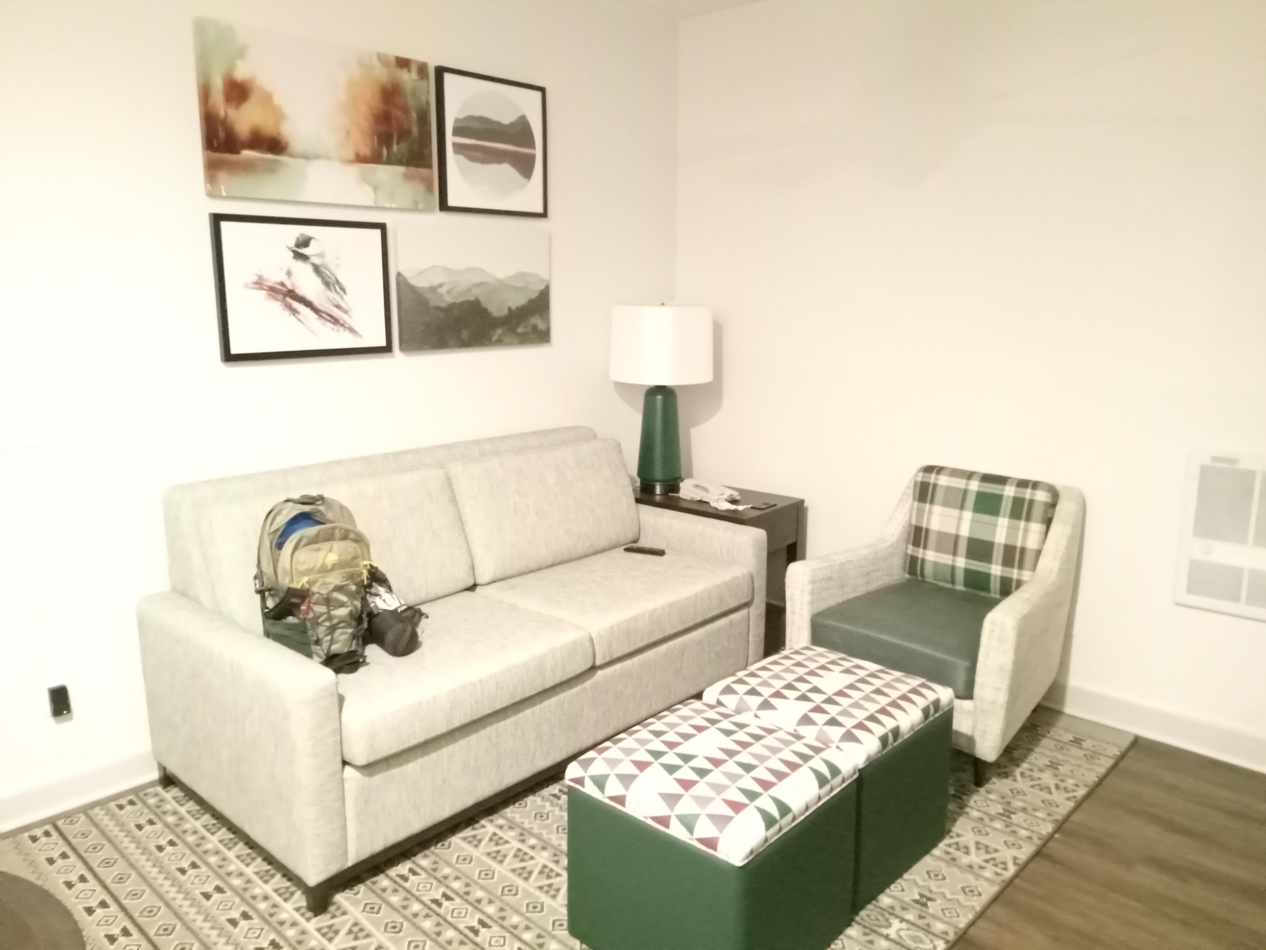 Separate TV room blocked hallway noise from bedroom.