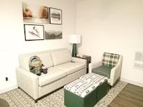 Separate TV room blocked hallway noise from bedroom.