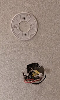 Ceiling view, where there is no fire or smoke detector.
