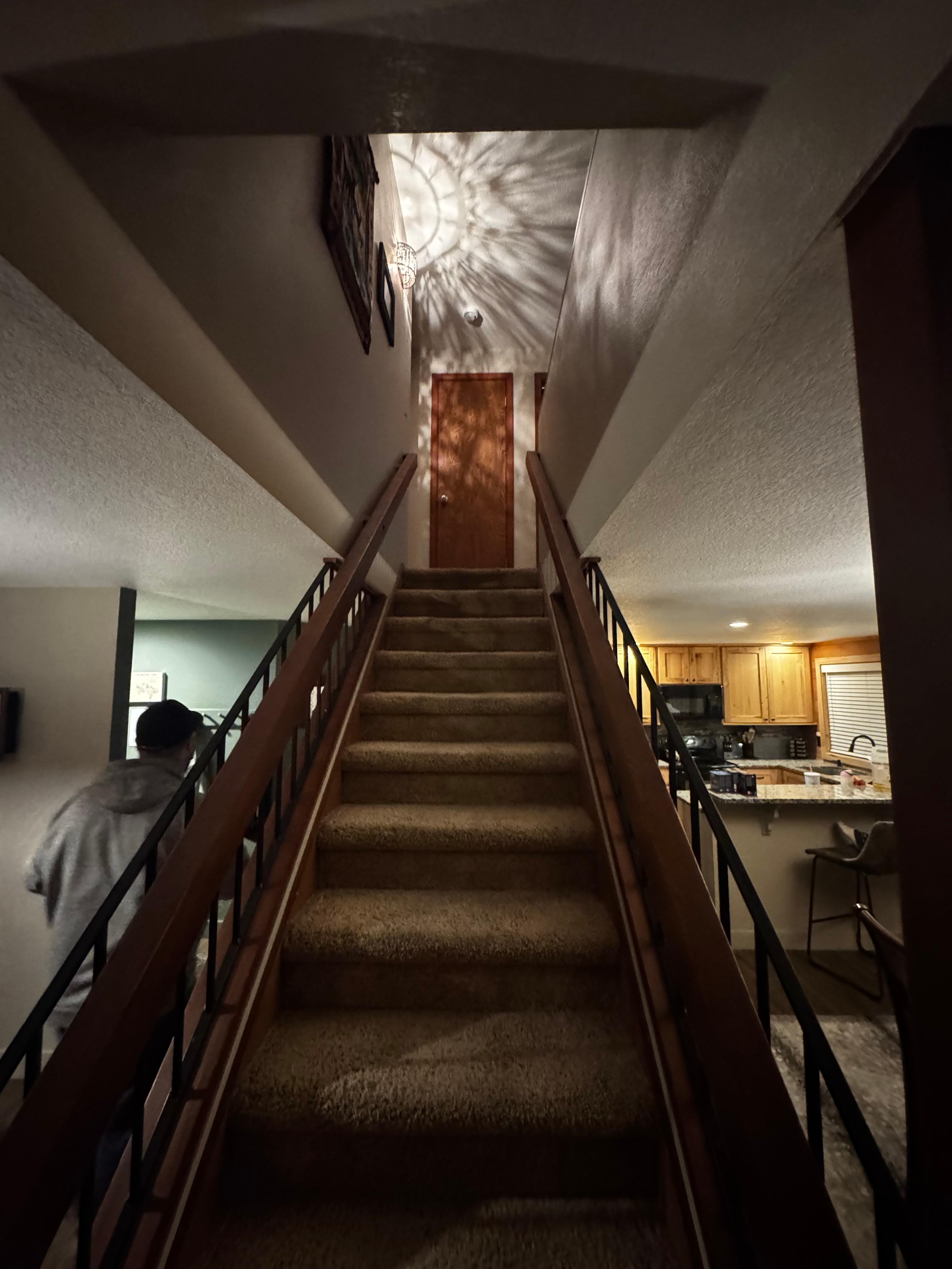 Stairs to two additional rooms and a nice loft for kids 