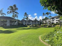 Large grass area next to the lanai patio.
