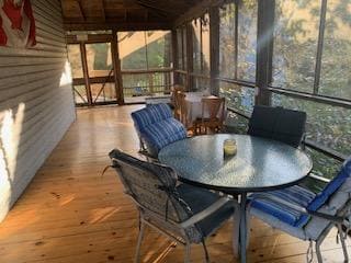 The screened in porch
with a great floor and
green surround. 