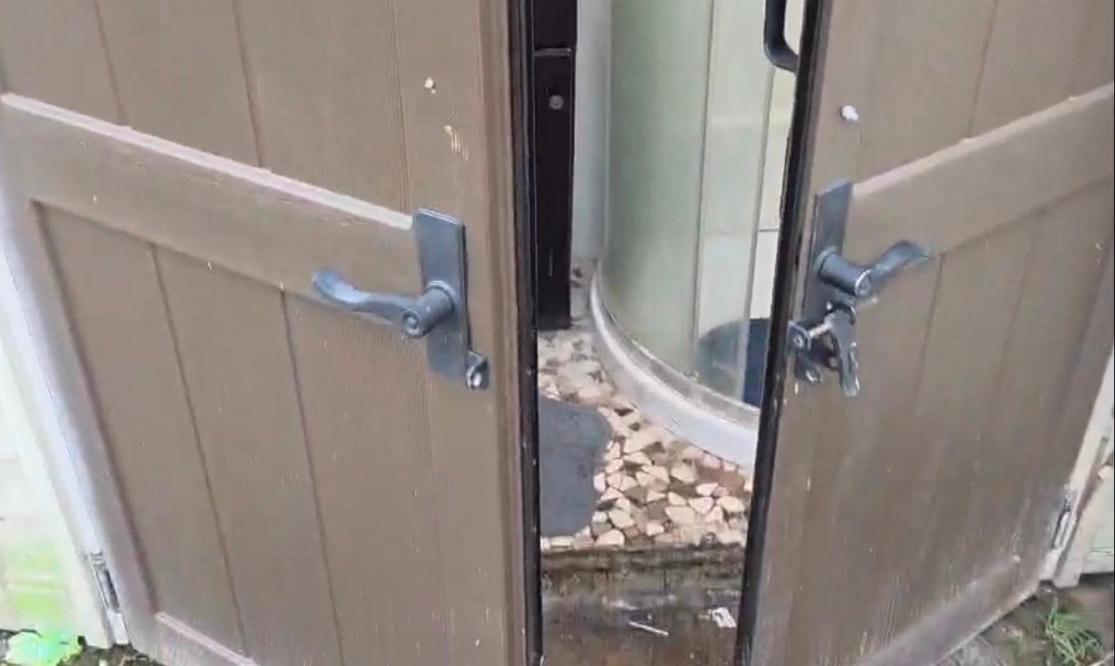 Plastic shed from Wal-Mart for a bathroom. 