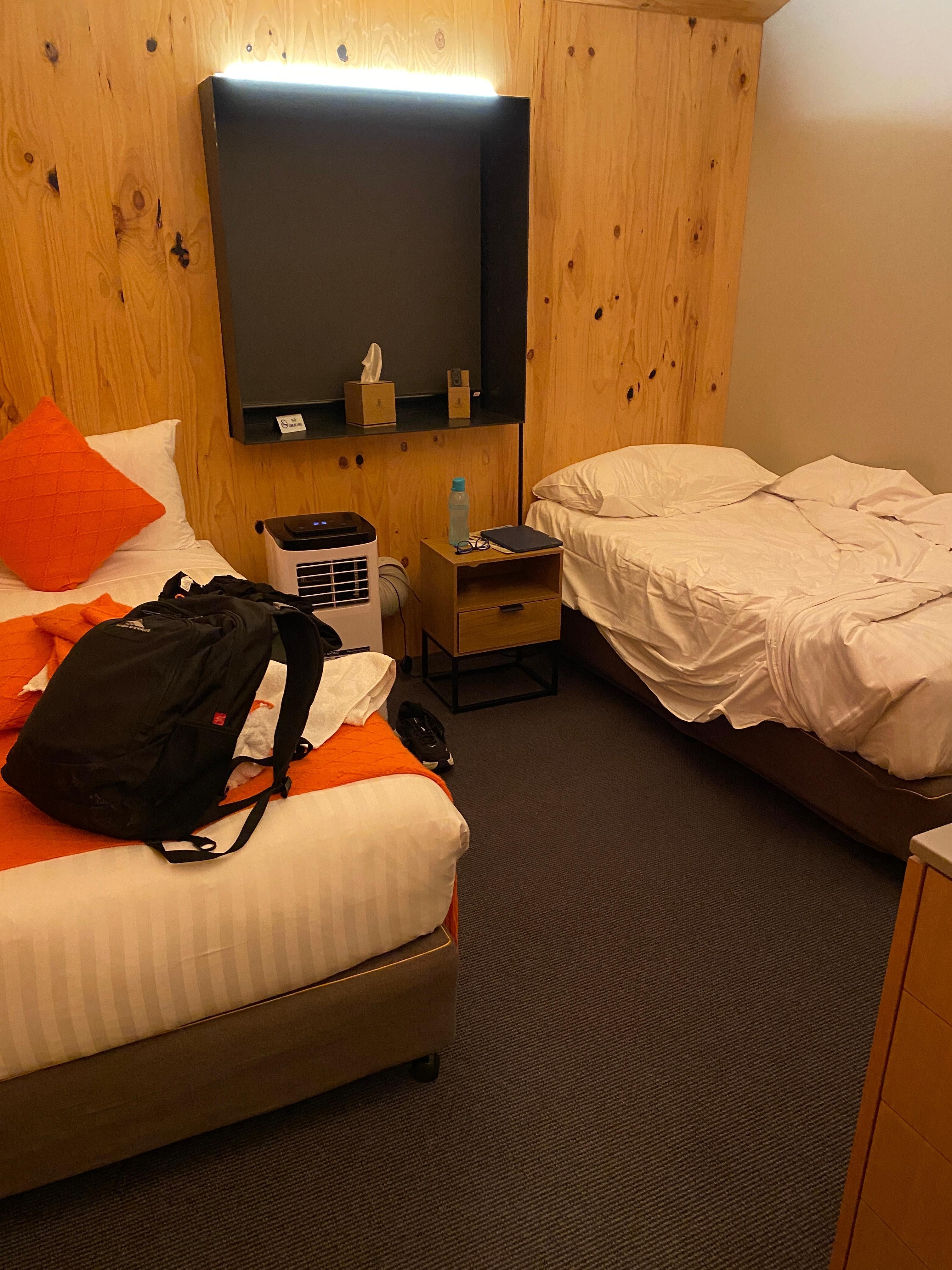 A/C unit, no plugs near bed head