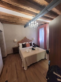 Beautiful room with thoughtful snacks and water provided.
