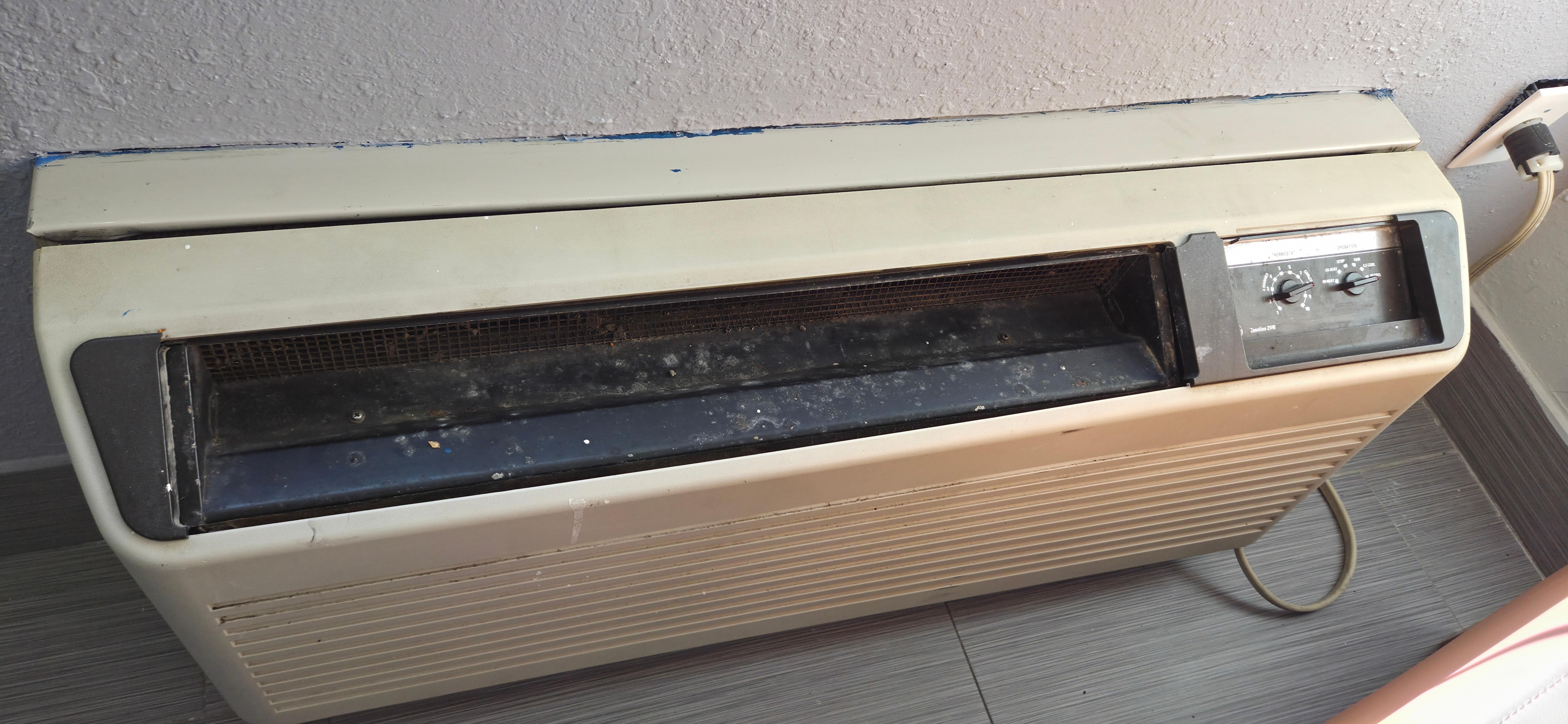 Broken, dirty AC unit