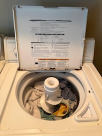 Washing machine lid very rusty; be careful putting clothes in or taking out