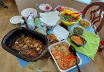 A well appointed Christmas dinner - prime rib, salmon, veggies and salad
