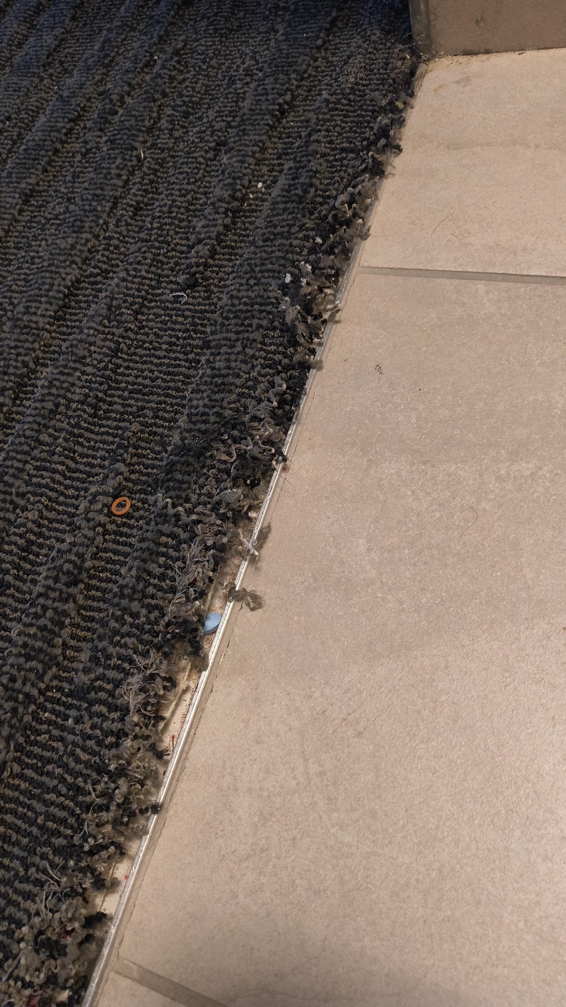 Look closely you can see the red tack strip