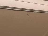 Underneath window in bedroom